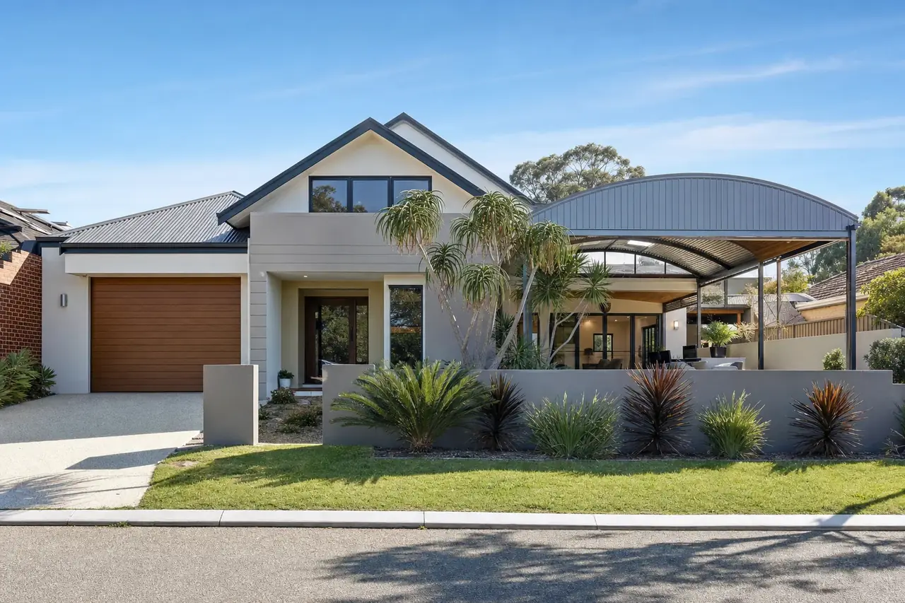 Contemporary home with an attached dome patio seen from the street